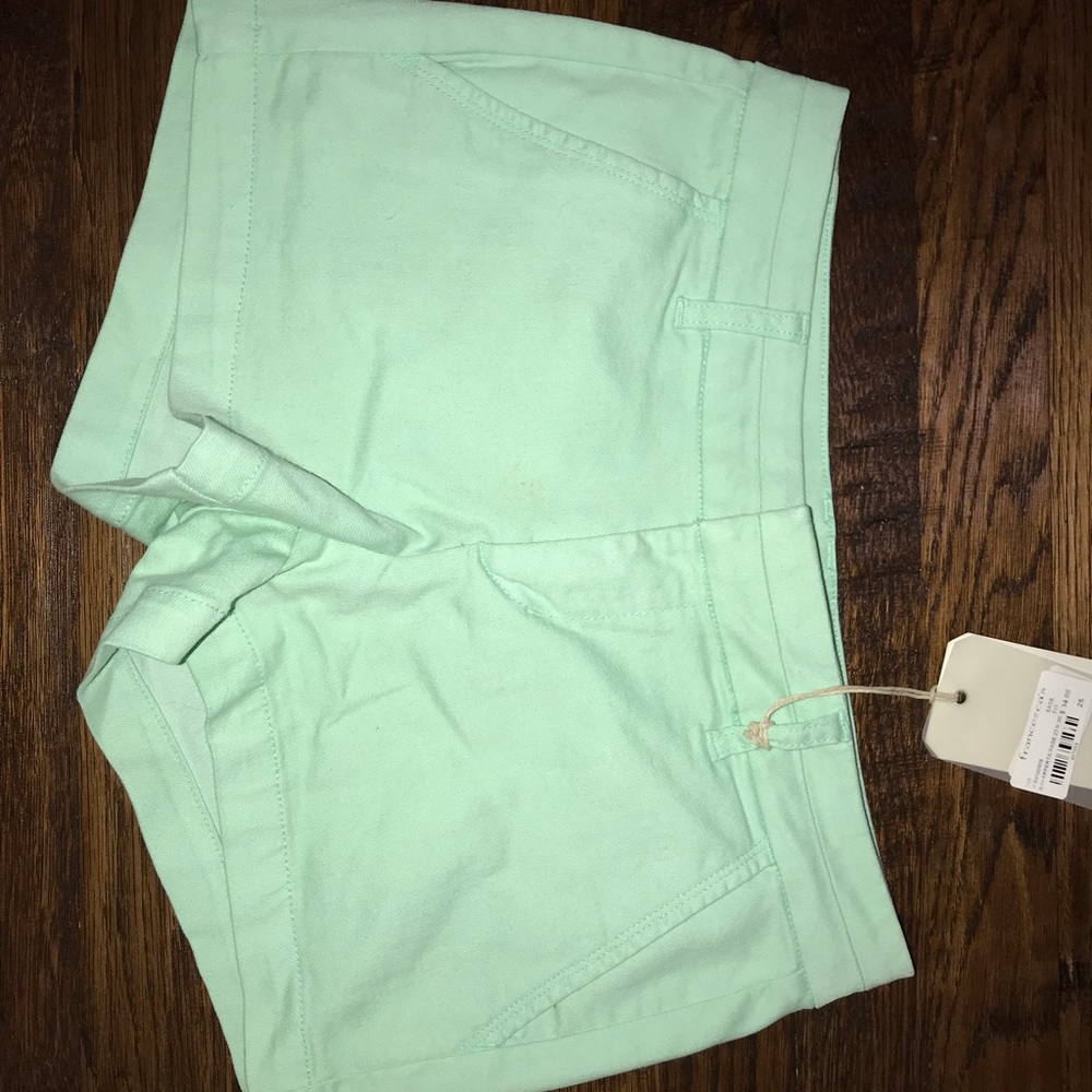 green shorts